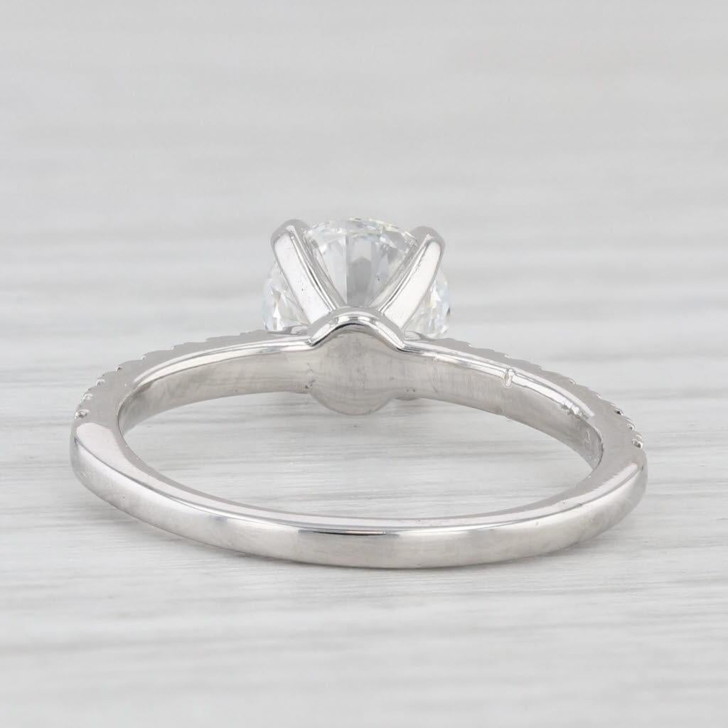 Gemstone Information:
- Natural Diamond -
Carats - 1.236ct 
Cut - Round Brilliant
Color - F
Clarity - VS2

- Natural Diamonds -
Total Carats - 0.14ctw
Cut - Round Brilliant
Color - F - G
Clarity - VS2 - SI1

Metal: Platinum
Weight: 3.8 Grams