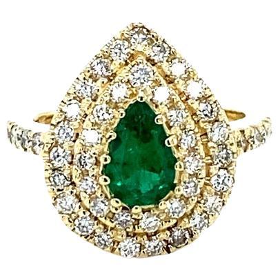 1.38 Carat Colombian Emerald Double Halo Diamond Yellow Gold Ring

Item Specs:

Pear Cut Colombian Emerald = 0.56 Carats
47 Round Cut Diamonds = 0.82 Carats (Clarity: SI1, Color: F)
14KY Gold = 6.9 Grams
Total Carat Weight = 1.38 Carats

Ring size =