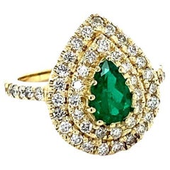 1.38 Carat Colombian Emerald Double Halo Diamond Yellow Gold Ring