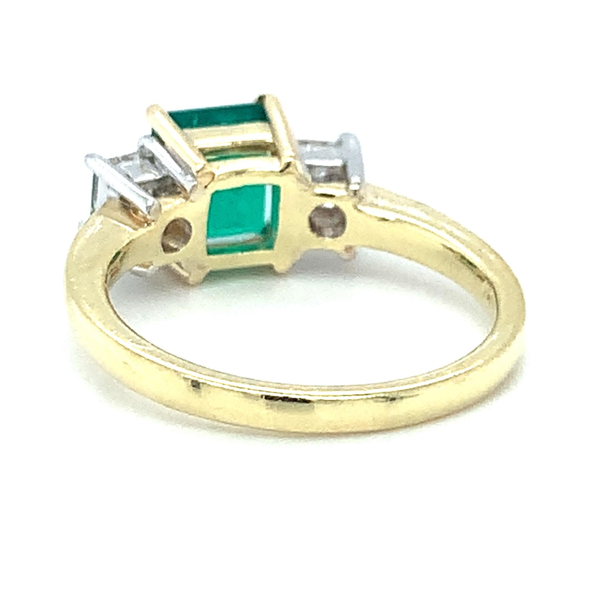 Emerald Cut 1.38 Carat Emerald and Diamond 3-Stone Engagement Ring in White and Yellow Gold For Sale
