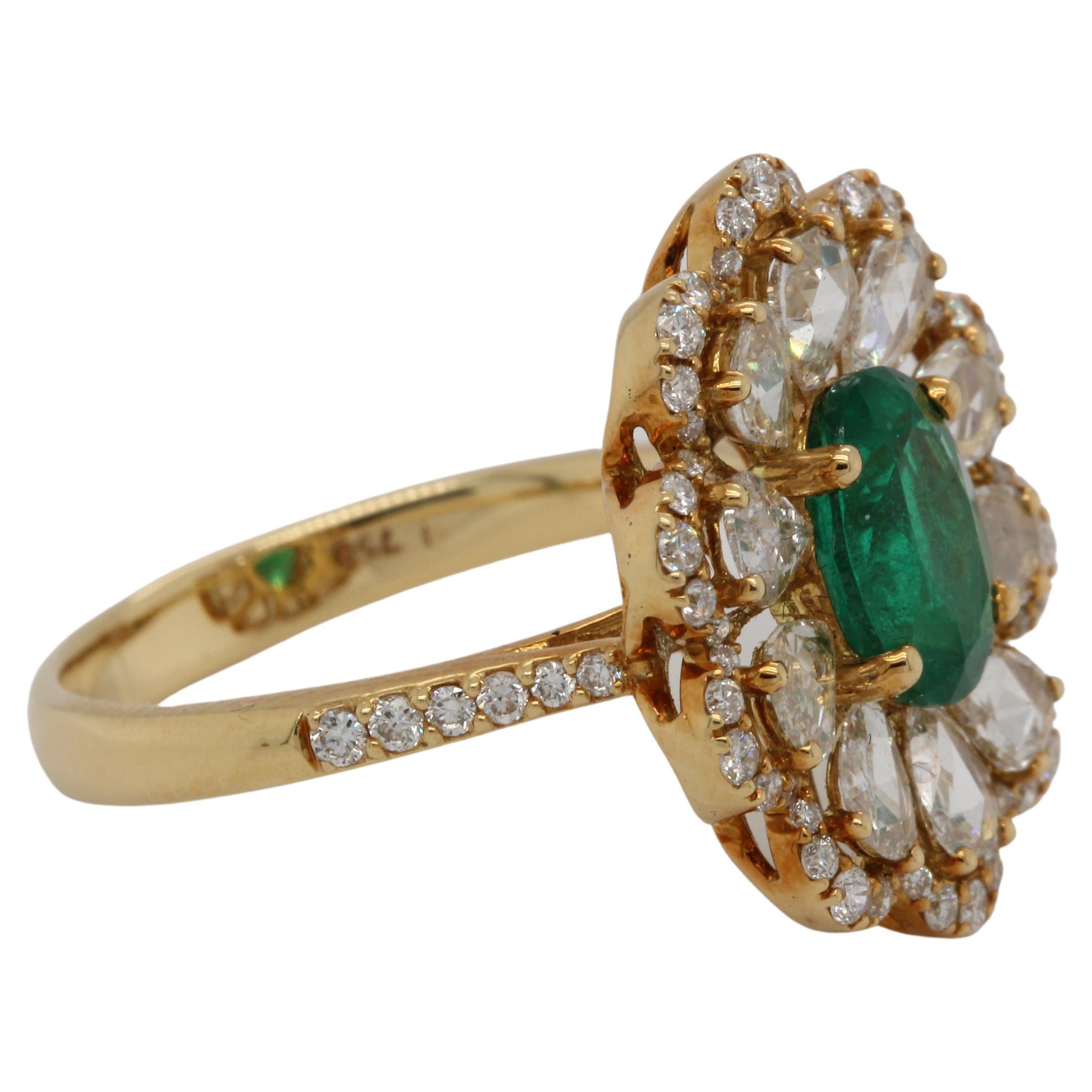 Oval Cut 1.38 Carat Emerald and Diamond Ring in 18 Karat Gold