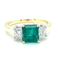 1.38 Carat Emerald and Diamond 3-Stone Engagement Ring in White and Yellow Gold