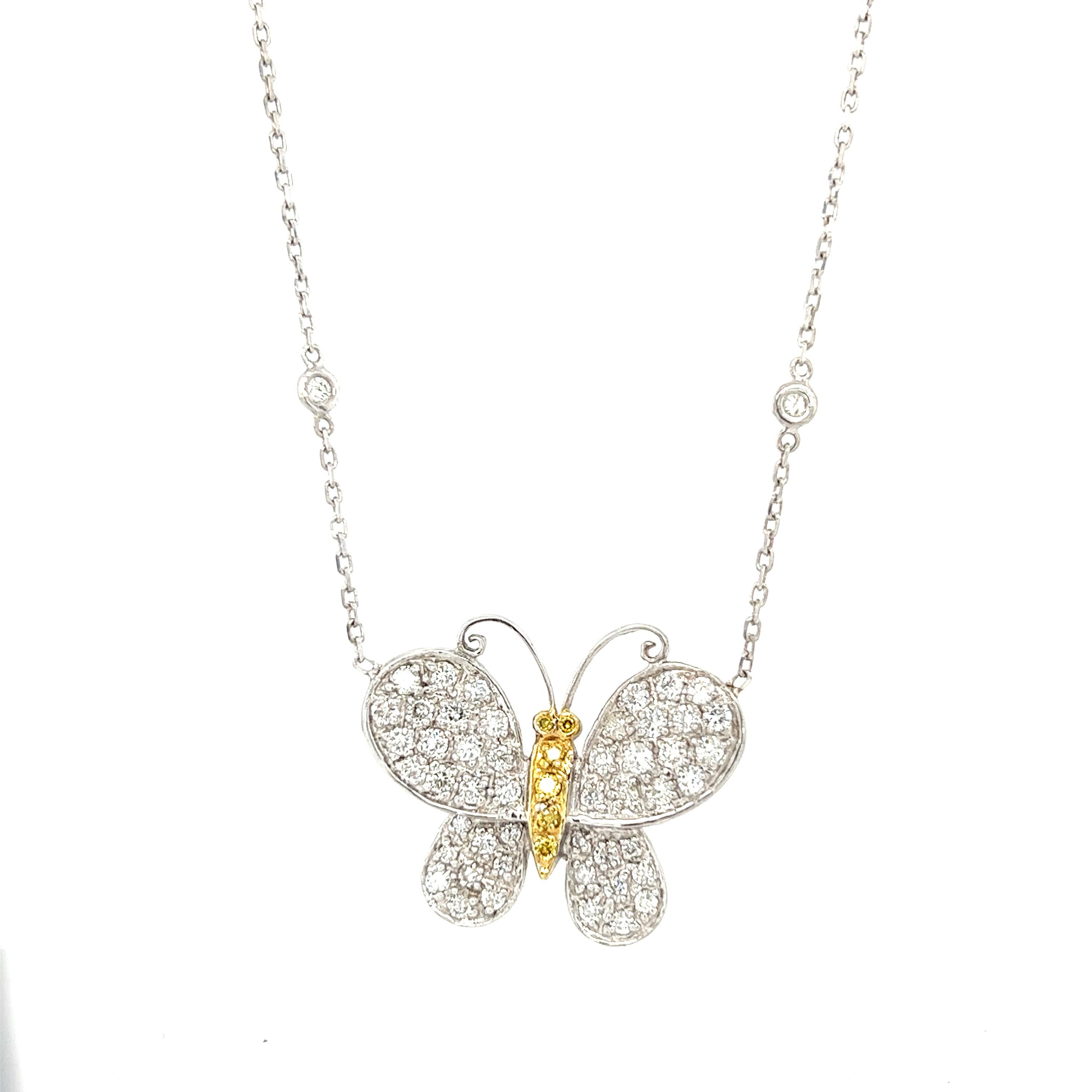 This beautiful butterfly shaped necklace has Natural Round Cut Diamonds that weigh 1.30 carats and Natural Orange Round Cut Diamonds that weigh 0.08 carats. The total carat weight of the necklace is 1.38 carats. 

The chain measures at 18 inches