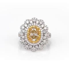 1.38 Carat Oval Shape Fancy Yellow Diamond Engagement Ring