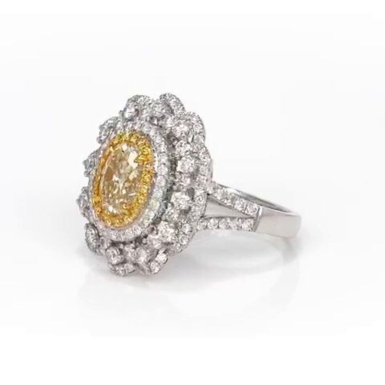 Oval Cut 1.38 Carat Oval Shape Fancy Yellow Diamond Engagement Ring For Sale