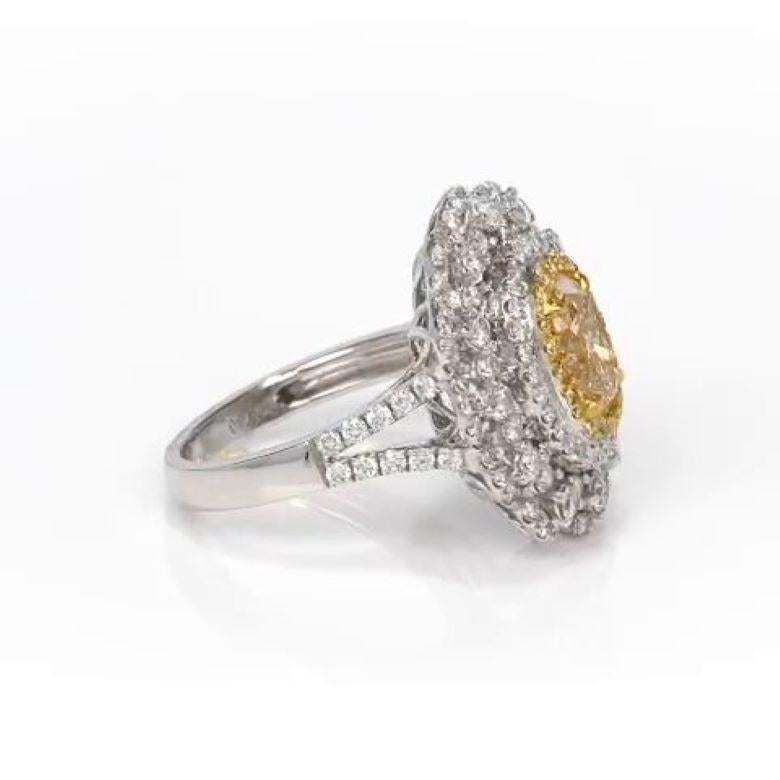 Women's 1.38 Carat Oval Shape Fancy Yellow Diamond Engagement Ring For Sale