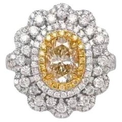 1,38 Karat Oval geformter Fancy Gelber Diamant-Verlobungsring