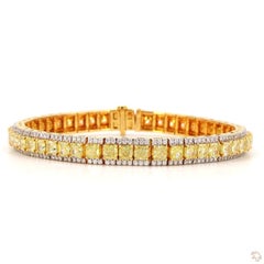 Armband aus Gelbgold mit einem weißen Diamanten im Rundbrillantschliff von 1,38 Karat und einem gelben Diamanten