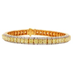Armband aus Gelbgold mit einem weißen Diamanten im Rundbrillantschliff von 1,38 Karat und einem gelben Diamanten
