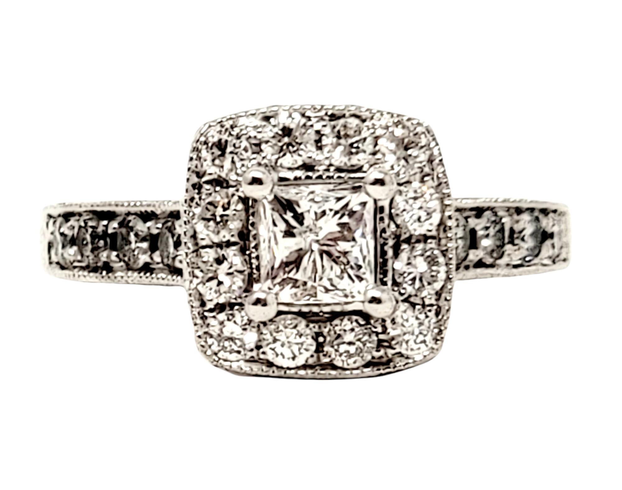 Ring size: 4.5

Breathtaking princess cut diamond halo engagement ring will absolutely radiate on her finger. The sparkling cushion center stone is paired with a glittering halo of round brilliant diamonds, allowing this ultra feminine piece to