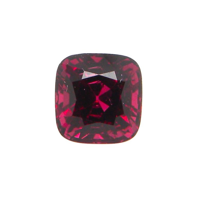 1.38 Carat Unheated Cushion-Cut Burmese Red Spinel:

A gorgeous gem, it is a 1.38 carat unheated cushion-cut Burmese red spinel. Hailing from the important Bawmar mine in Burma, the spinel possesses an intense red colour saturation, with great