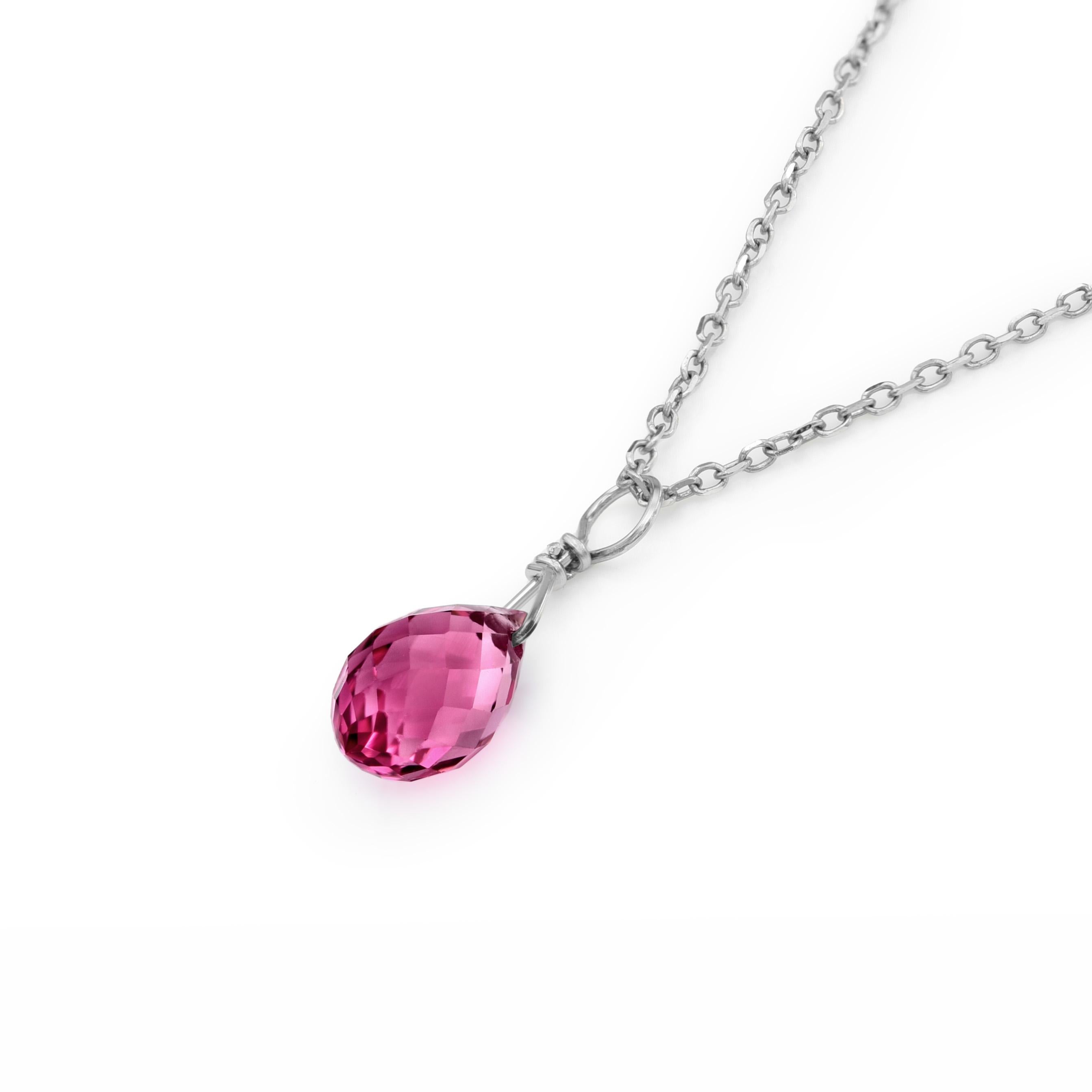 Discover the enchanting elegance of our Pink Tourmaline Pendant, featuring 1.38 carats gem from Brazil. Set in 14K White Gold and accompanied by an 18 inches Spring Chain, this pendant radiates beauty and sophistication. The briolette shape of the