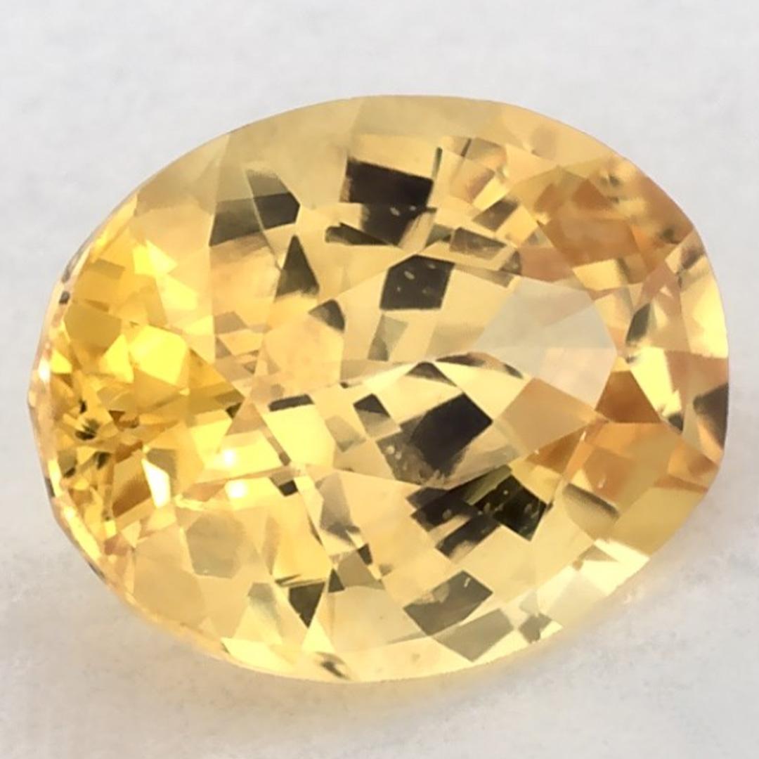 This natural Yellow sapphire offers elegance and sophistication. With its rich color saturation and precise cutting, it is the perfect centerpiece for an engagement ring or luxury jewelry design.

This sapphire originates from Sri Lanka (Ceylon),