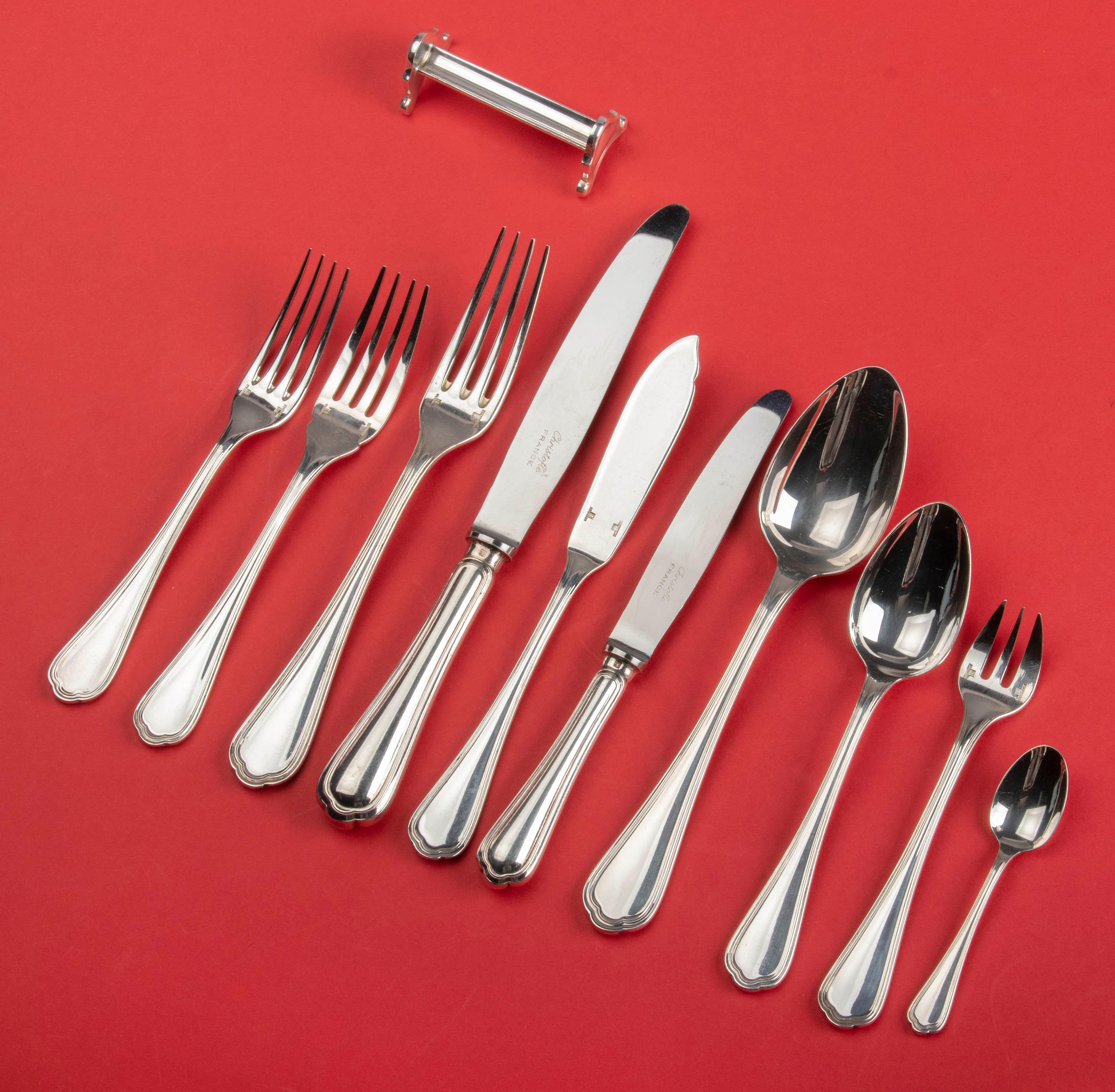 Great set of silver plated flatware for 12 people from the French brand Christofle. The model's name is Spatours, a classic and timeless design with curves at the bottom of the handles and a fine line. The cutlery is in very good condition and has a