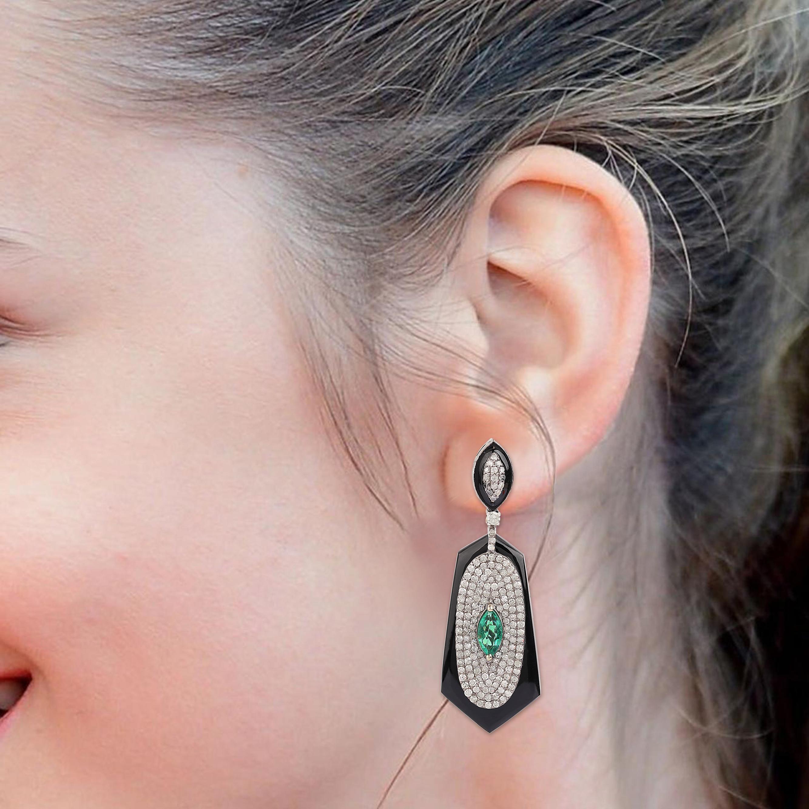 13.80 Carats Diamond, Emerald, and Black Onyx Drop Earrings in Contemporary Style

Breathtaking design and amazing combination of black onyx, diamonds and emerald is what makes this pair of earrings a style statement. This set of earrings is
