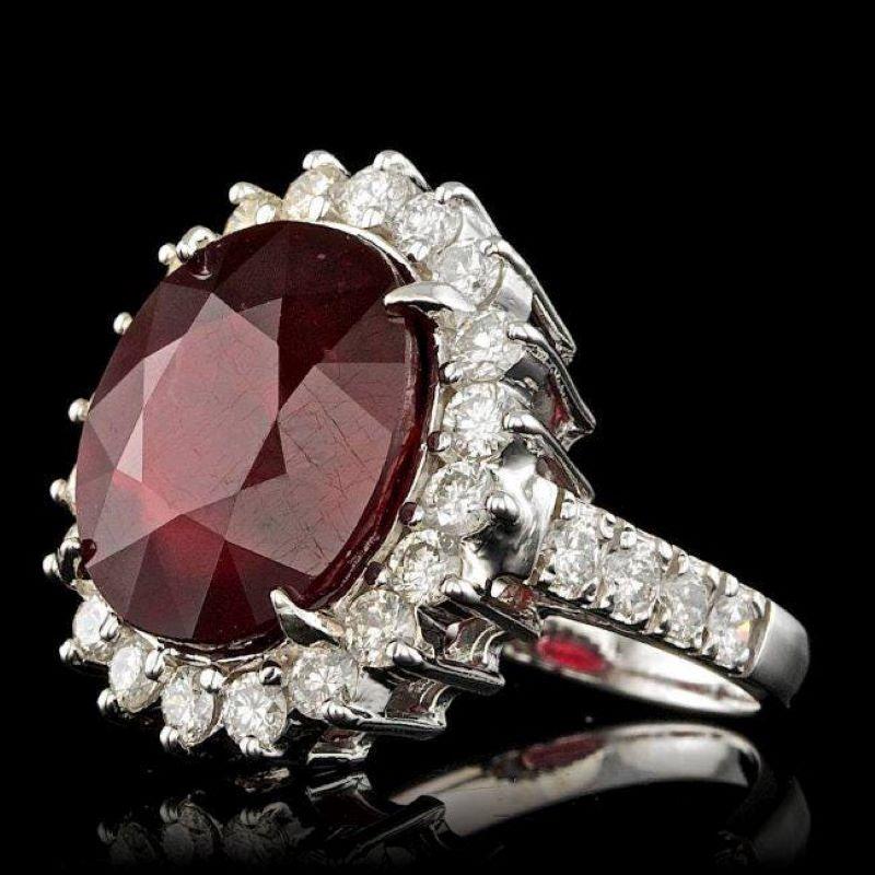13.80 Carats Natural Red Ruby and Diamond 14K Solid White Gold Ring

Total Red Ruby Weight is: Approx. 12.40 Carats

Ruby Measures: Approx. 14.00 x 12 mm

Ruby treatment: Fracture Filling

Natural Round Diamonds Weight: Approx. 1.40 Carats (color