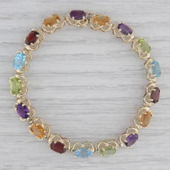13.80ctw Gemstone Tennis Bracelet 14k Gold 6.75" Garnet Topaz Amethyst Citrine