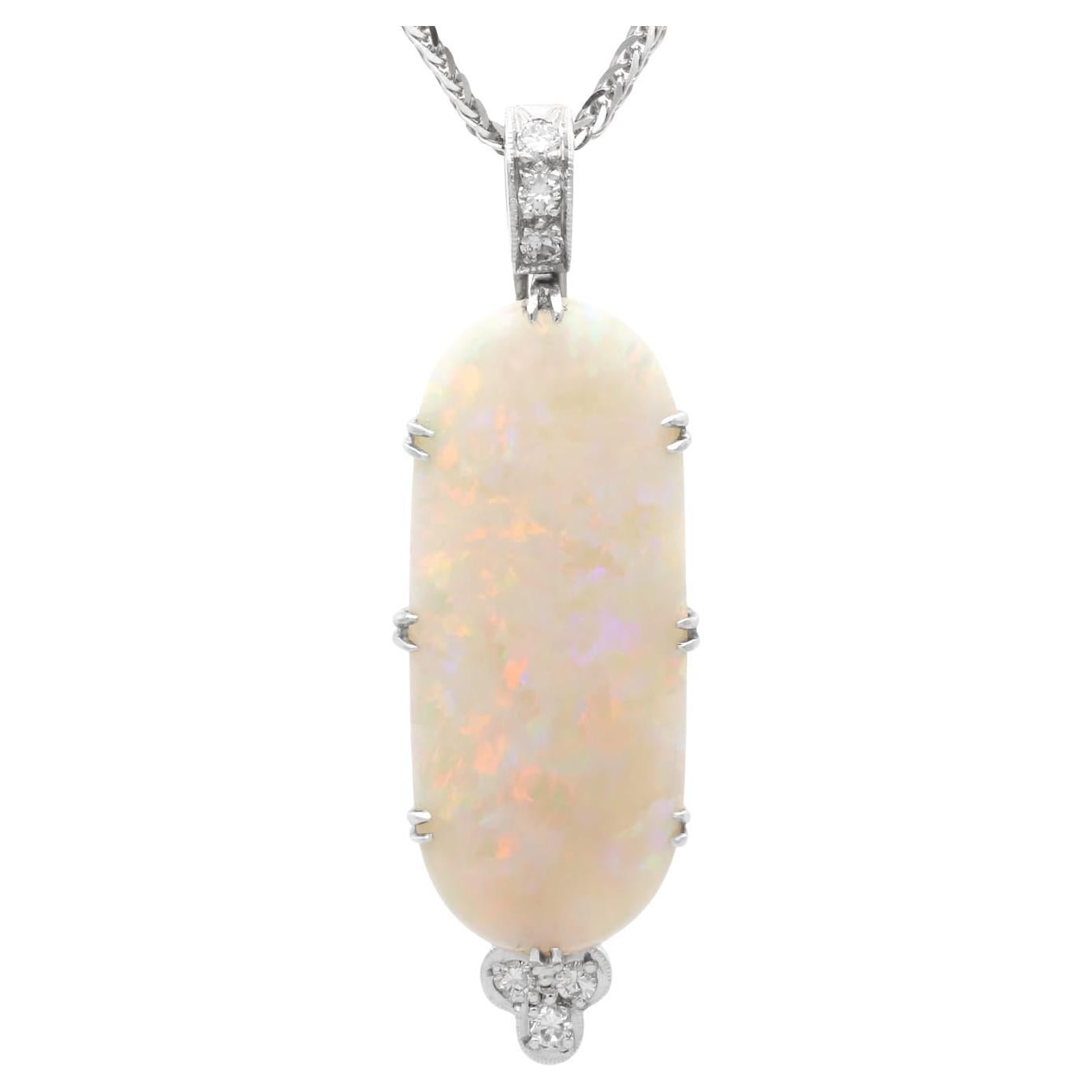 13.82 Carat Opal and 0.24 Carat Diamond, 18 Karat Yellow Gold Pendant Circa 1910
