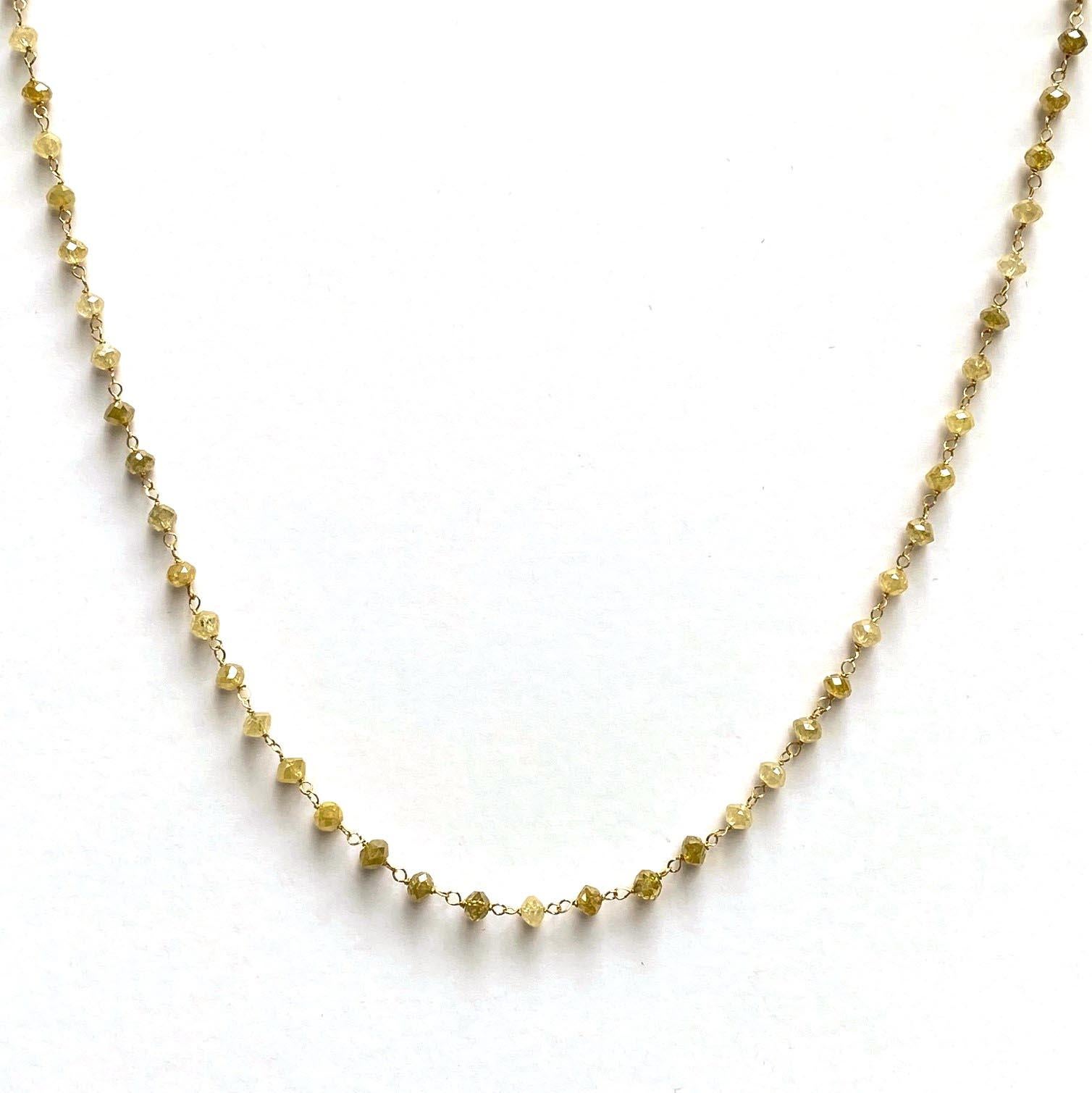 An 18k yellow gold 17-inch necklace with 13.87 total carat weight yellow diamond beads. This necklace was designed and made by llyn strong.