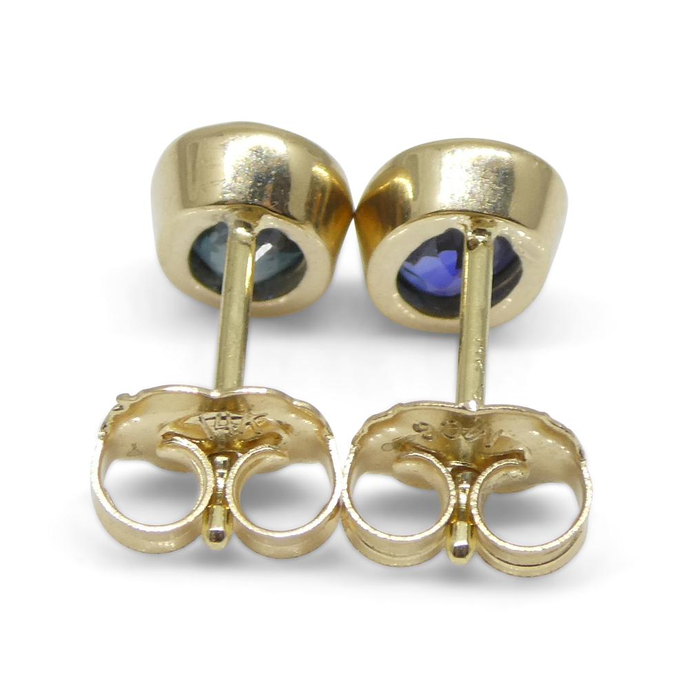 1.38ct Oval Blue Sapphire Stud Earrings set in 14k Yellow Gold For Sale 5