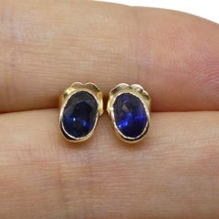 1.38ct Oval Blue Sapphire Stud Earrings set in 14k Yellow Gold