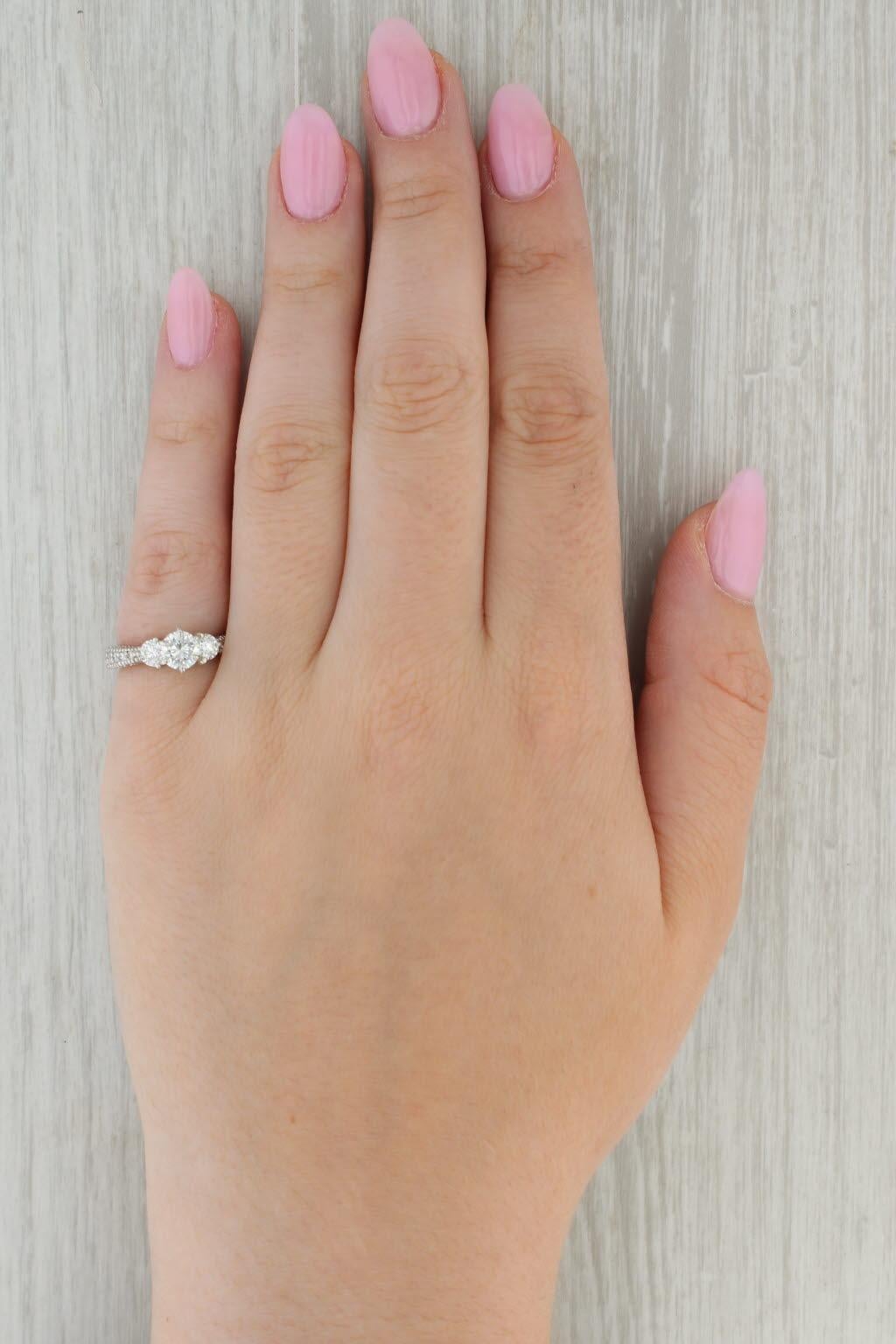 Gemstone Information:
- Natural Diamond -
Carats - 0.70ct
Cut - Round Brilliant
Color - G - H
Clarity - VS2

- Natural Diamonds -
Total Carats - 0.44ctw 
Cut - Round Brilliant
Color - H - I
Clarity - SI2 - I1

- Natural Diamonds -
Total Carats -
