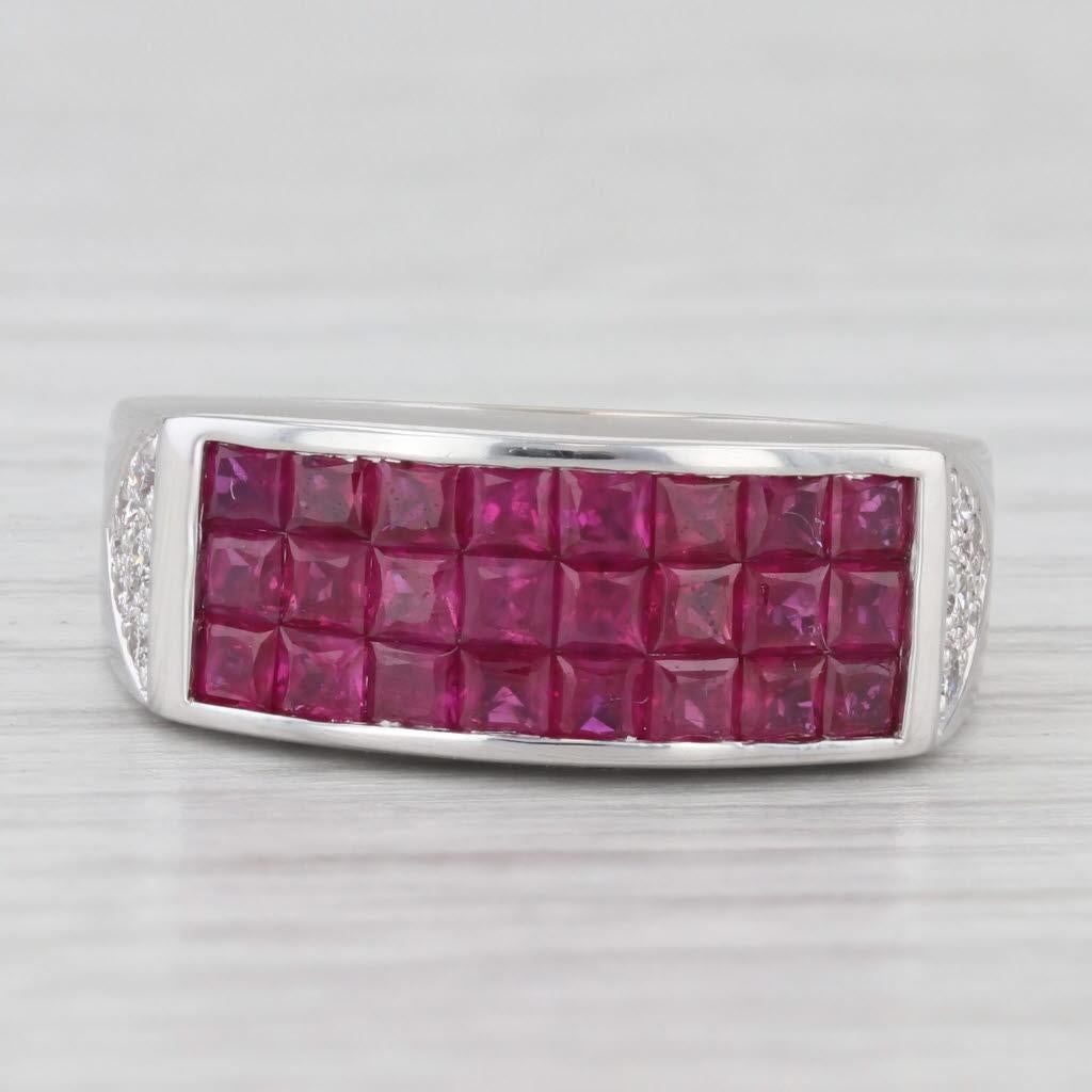 Gemstone Information:
- Natural Rubies -
Total Carats - 1.20ctw
Cut - Princess Brilliant
Color - Red
Treatment - Routinely Enhanced 

- Natural Diamonds -
Total Carats - 0.18ctw
Cut - Round Brilliant
Color - H - I
Clarity - VS2 - I1

Metal: 18k