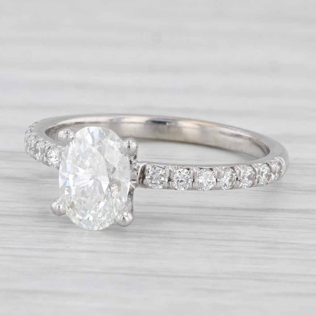 Gemstone Information:
- Natural Diamond -
Carats - 1.12ct
Cut - Oval Brilliant
Color - H
Clarity - VS2
GIA: 2239106183

- Natural Diamonds -
Total Carats - 0.26ctw
Cut - Round Brilliant
Color - G - H
Clarity - VS2

Metal: 14k White Gold
Weight: 2.4