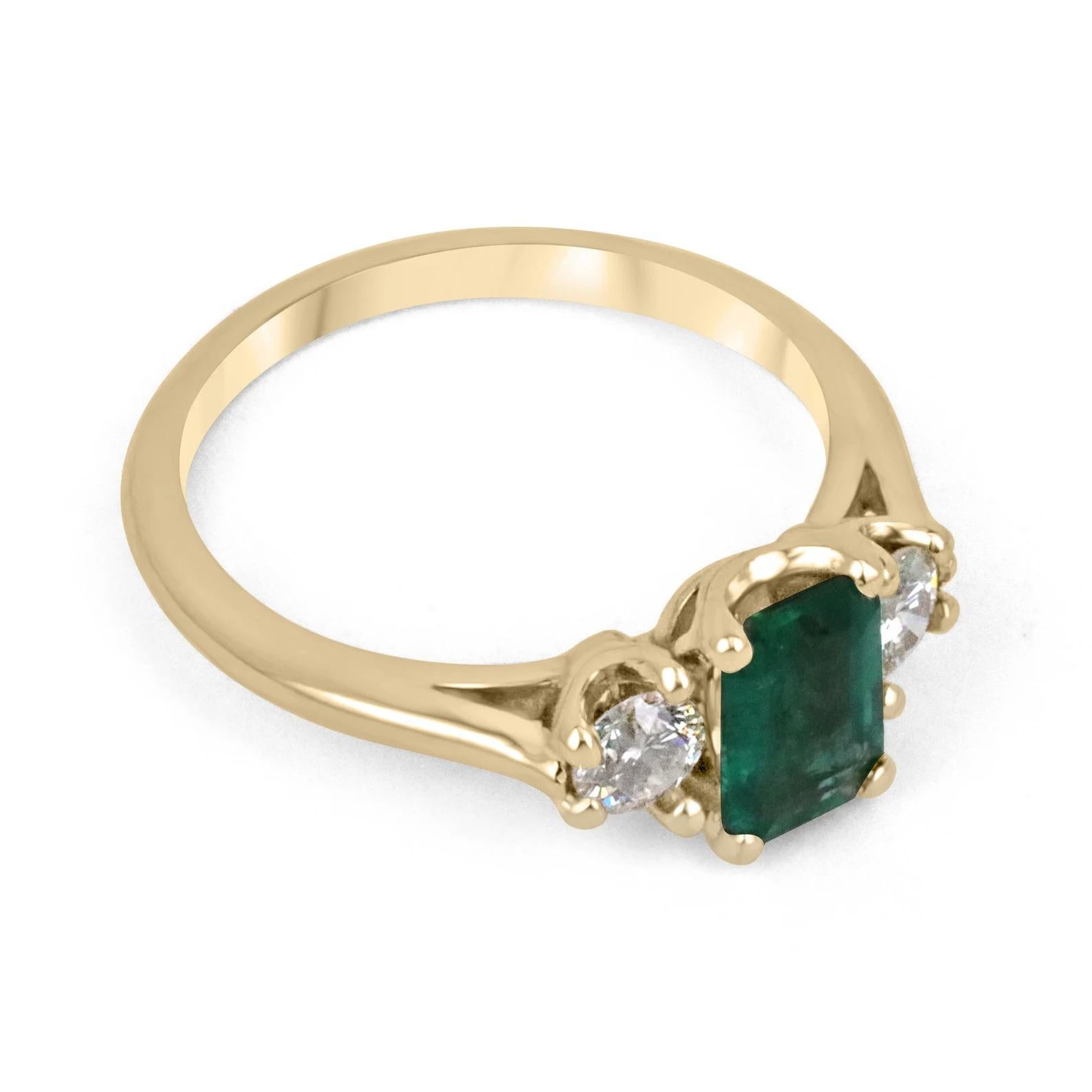 A classic emerald and diamond engagement, statement, or right-hand ring. Dexterously handcrafted in gleaming 14K gold this ring features a rare vivid 1.0-carat natural emerald-emerald cut. Set in a secure prong setting, this extraordinary emerald