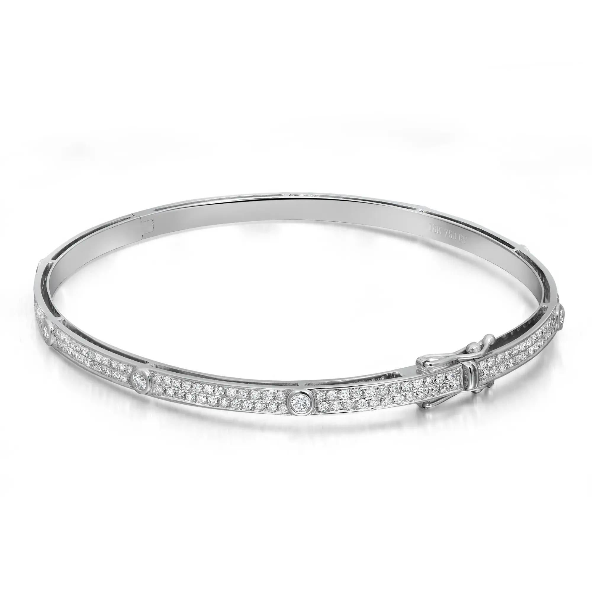 Adorn your wrist with the exquisite allure of our 1.39 Carat Diamond Pavé Bangle Bracelet in 18K White Gold. This captivating piece boasts a total carat weight of 1.39, featuring a dazzling array of diamonds meticulously set in a graceful pavé