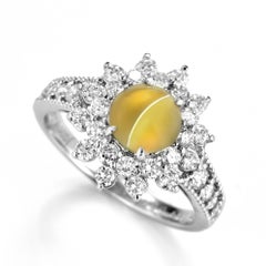 1.39 Carat 'Honey-Color' Cat's Eye Chrysoberyl and Diamond Ring Set in Platinum