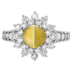 1.39 Carat 'Honey-Color' Cat's Eye Chrysoberyl and Diamond Ring Set in Platinum