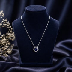 Ciondolo con zaffiro blu naturale da 1,39 carati e diamanti a corona, in oro bianco 18 carati