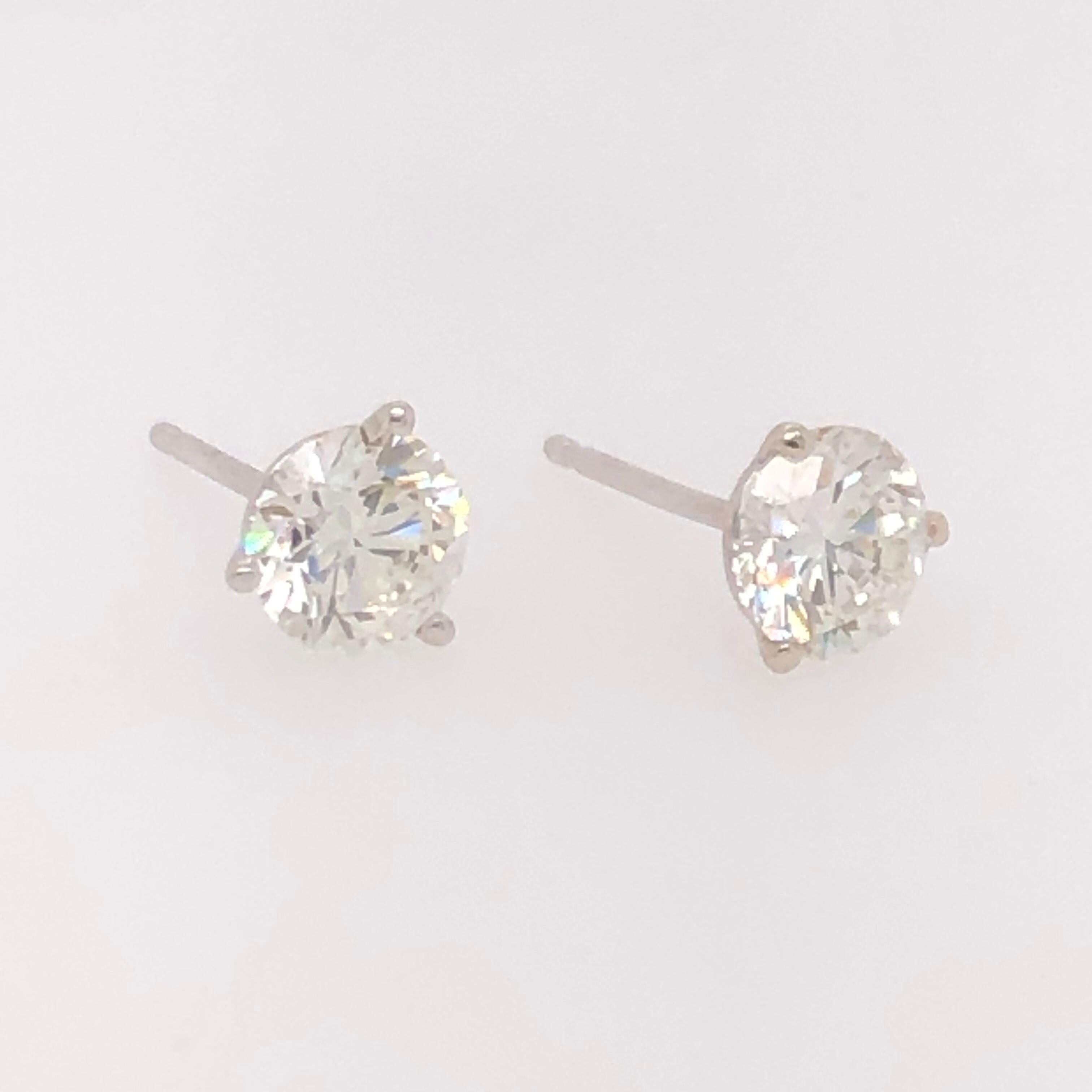 A timeless pair of diamond studs is a staple in women's (and men's) wardrobes. An appropriate gift for academic achievements or rights of passage, diamonds studs are a must have. 

Diamonds are graded on cut, color, clarity, and carat weight. Better