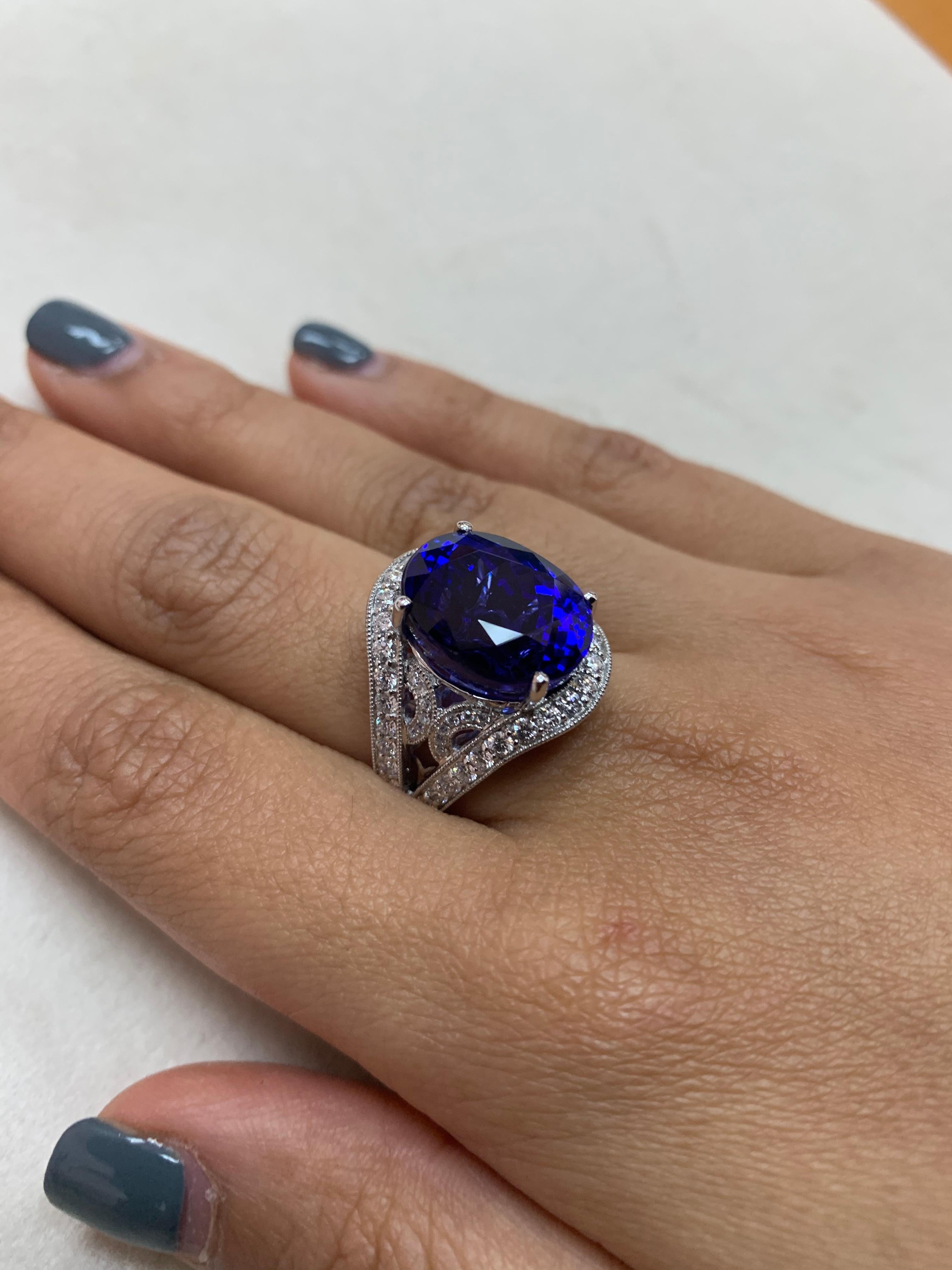 Oval Cut 13.9 Carat Tanzanite and White Diamond Ring in 18 Karat White Gold For Sale