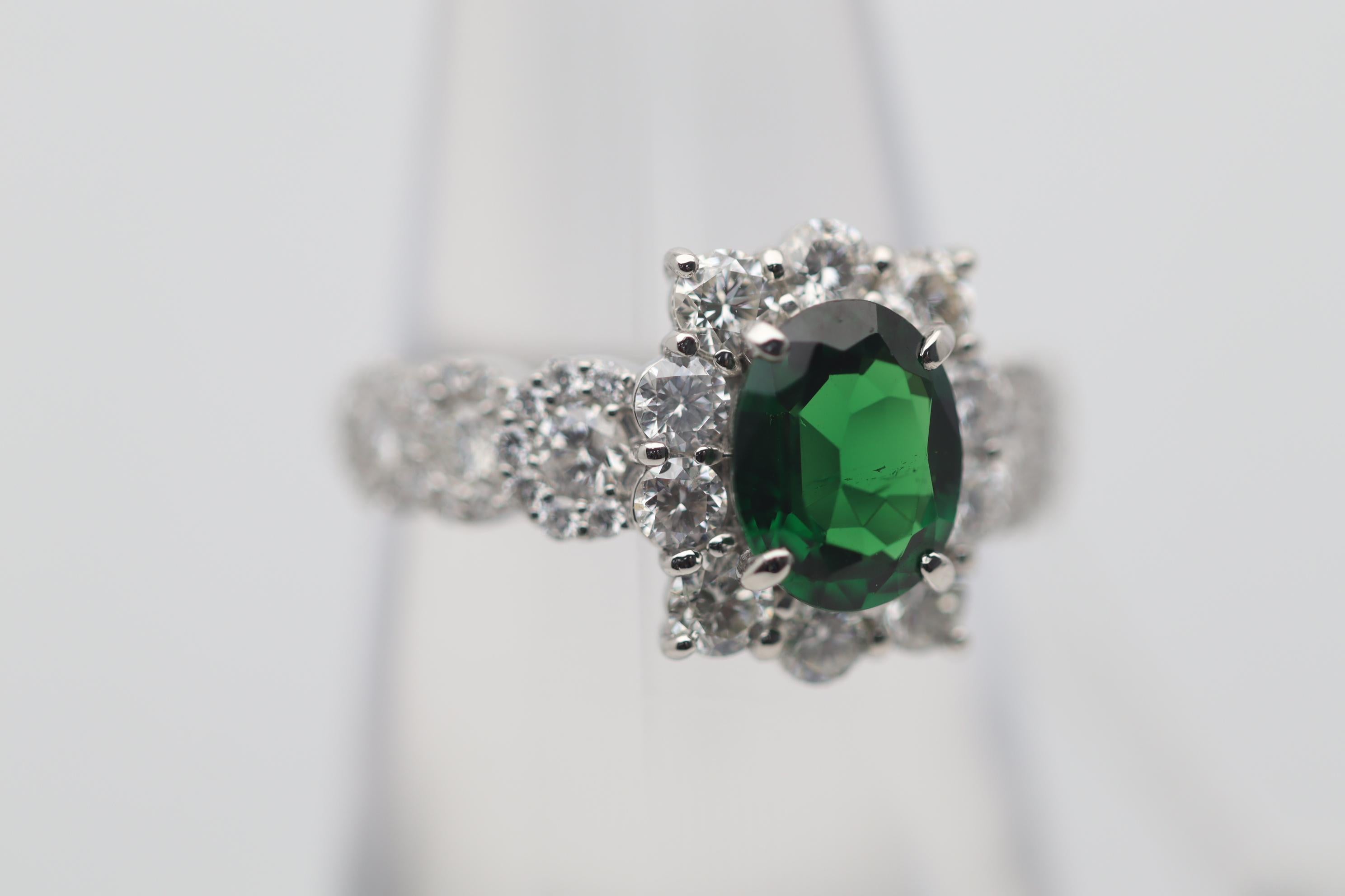 Oval Cut 1.39 Carat Tsavorite Diamond Platinum Ring For Sale