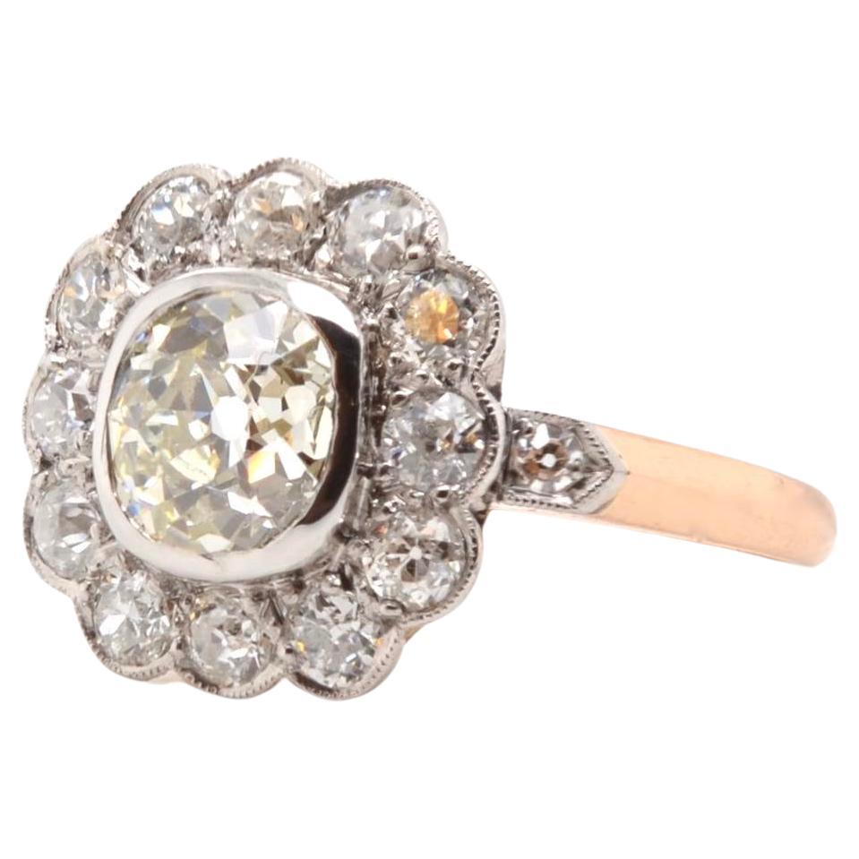 1.39 carats antique cushion cut diamond M/Vs1 diamond daisy ring For Sale