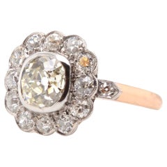 1.39 carats antique cushion cut diamond M/Vs1 diamond daisy ring