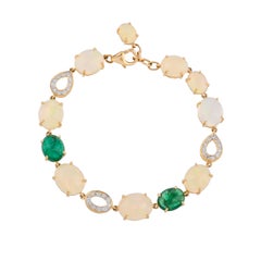 13.90 Carat Ethiopian Opal Emerald and Diamond 18kts Yellow Gold Bracelet