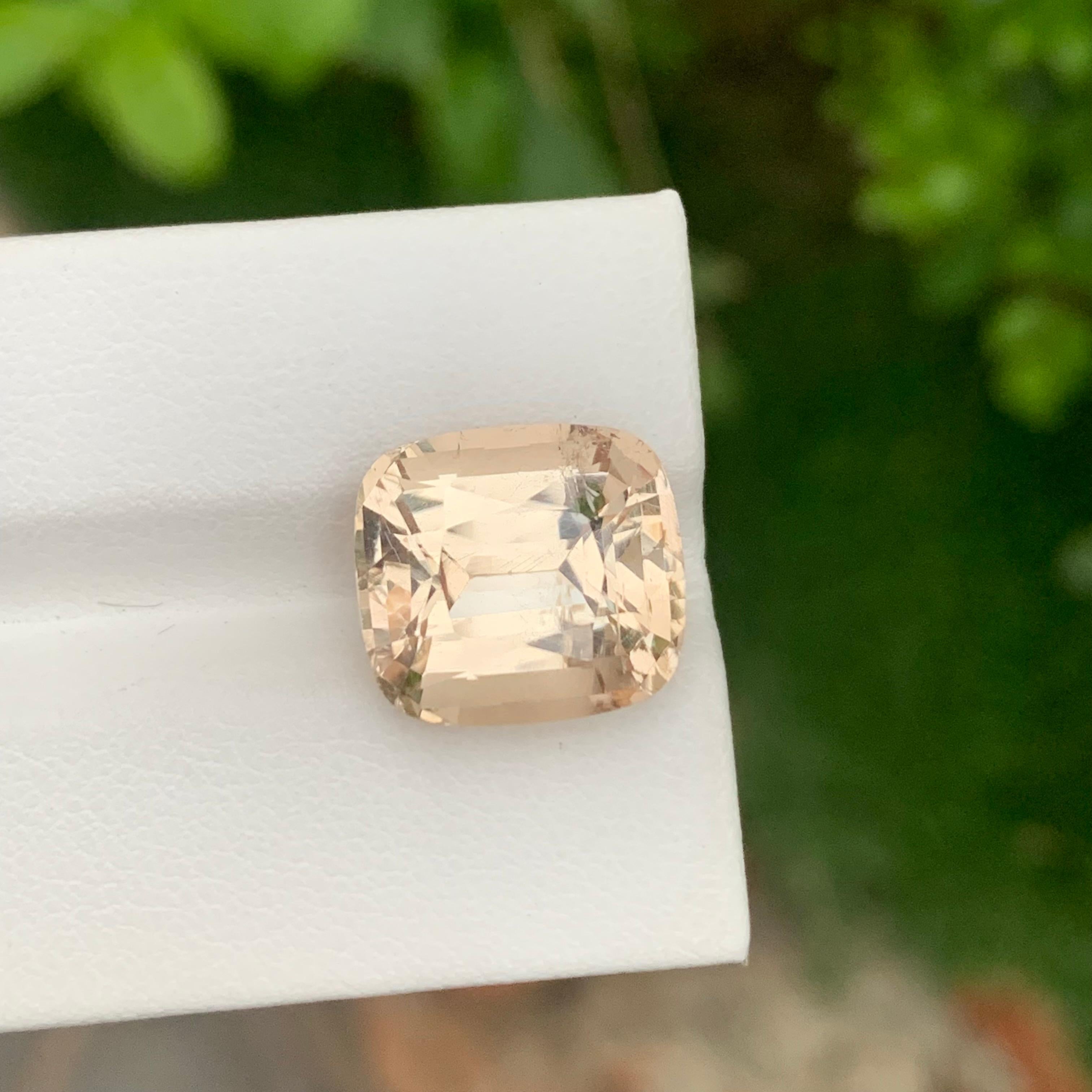 Faceted Imperial Topaz
Weight: 13.90 Carats
Dimension: 13.8 x 12.6 x 9.2 Mm
Origin: Katlang Pakistan
Shape: Cushion
Color; Imperial Golden 
Treatment: Non
Certificate: On Demand

Imperial Topaz encourages healthy boundaries and helps us be attracted
