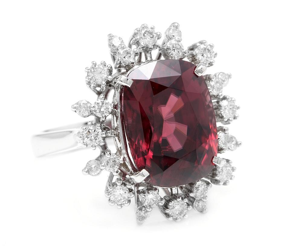 13.90 Carats Natural Red Zircon and Diamond 14K Solid White Gold Ring

Suggested Replacement Value: Approx. $9,500.00

Total Natural Oval Cut Zircon Weight is: Approx. 13.00 Carats 

Zircon Measures: Approx. 13.00 x 10.00mm

Natural Round Diamonds