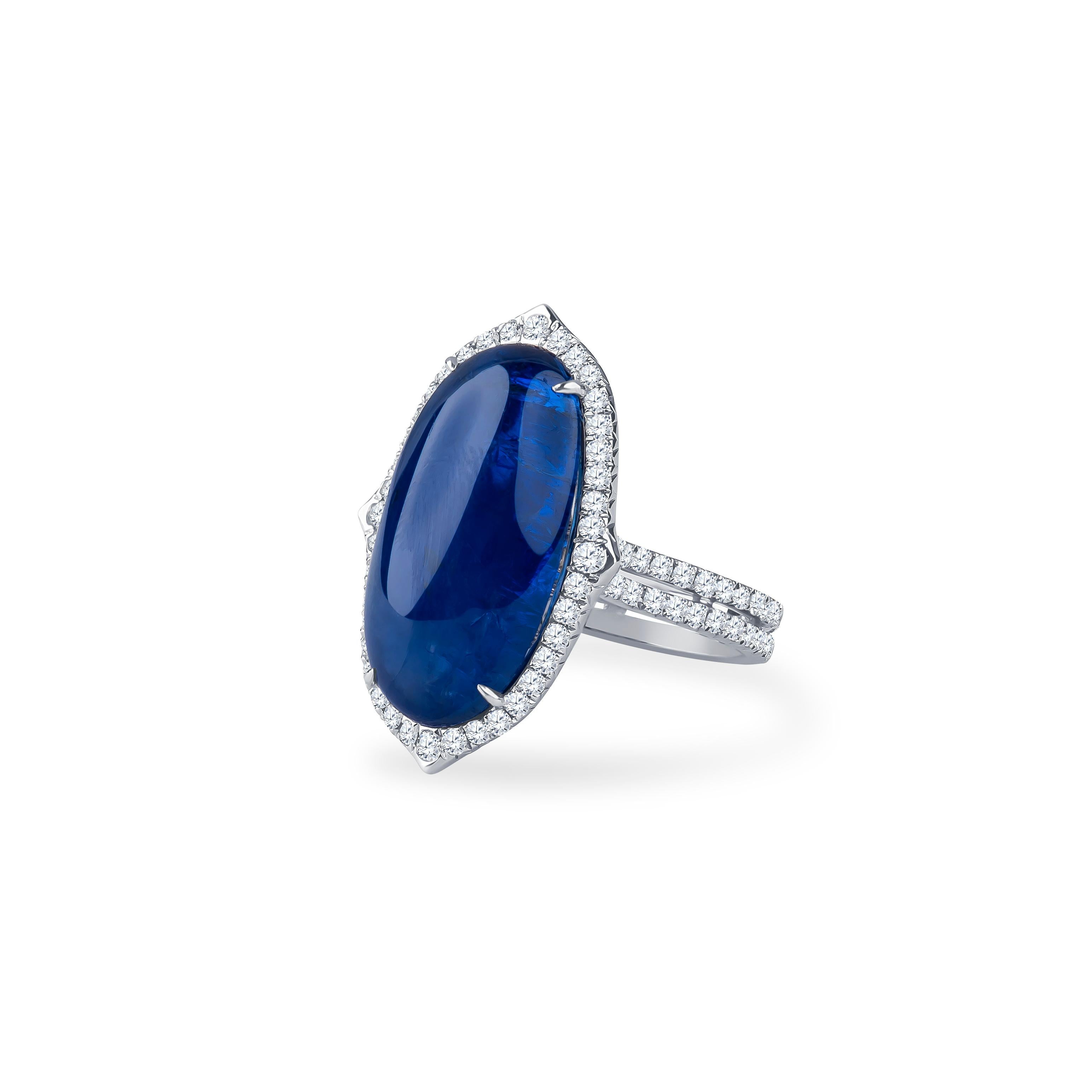 13.91 Carat unheated oval blue Burmese sapphire (GRS colored stone report) with 1.34 carats total weight in round brilliant diamonds set in an 18k white gold ring. Diamond clarity SI1. Ring size 6.5, size is resize-able to larger or smaller upon