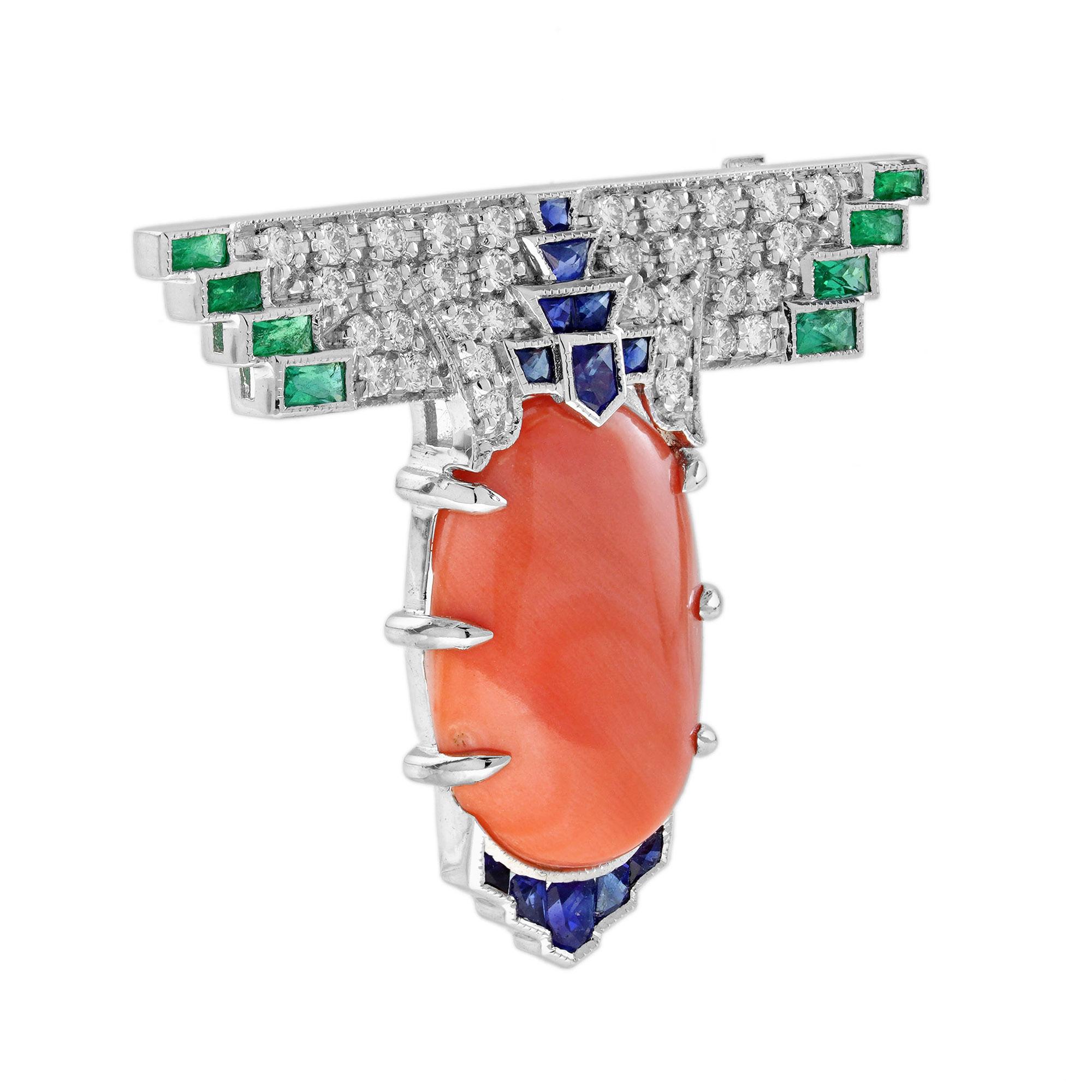 Eleva tu estilo con este exquisito Broche de Coral con Zafiro, Esmeralda y Diamante, una impresionante pieza elaborada en elegante oro blanco. El broche presenta una fascinante pieza central de coral de 13,91 quilates, conocida por su belleza única.