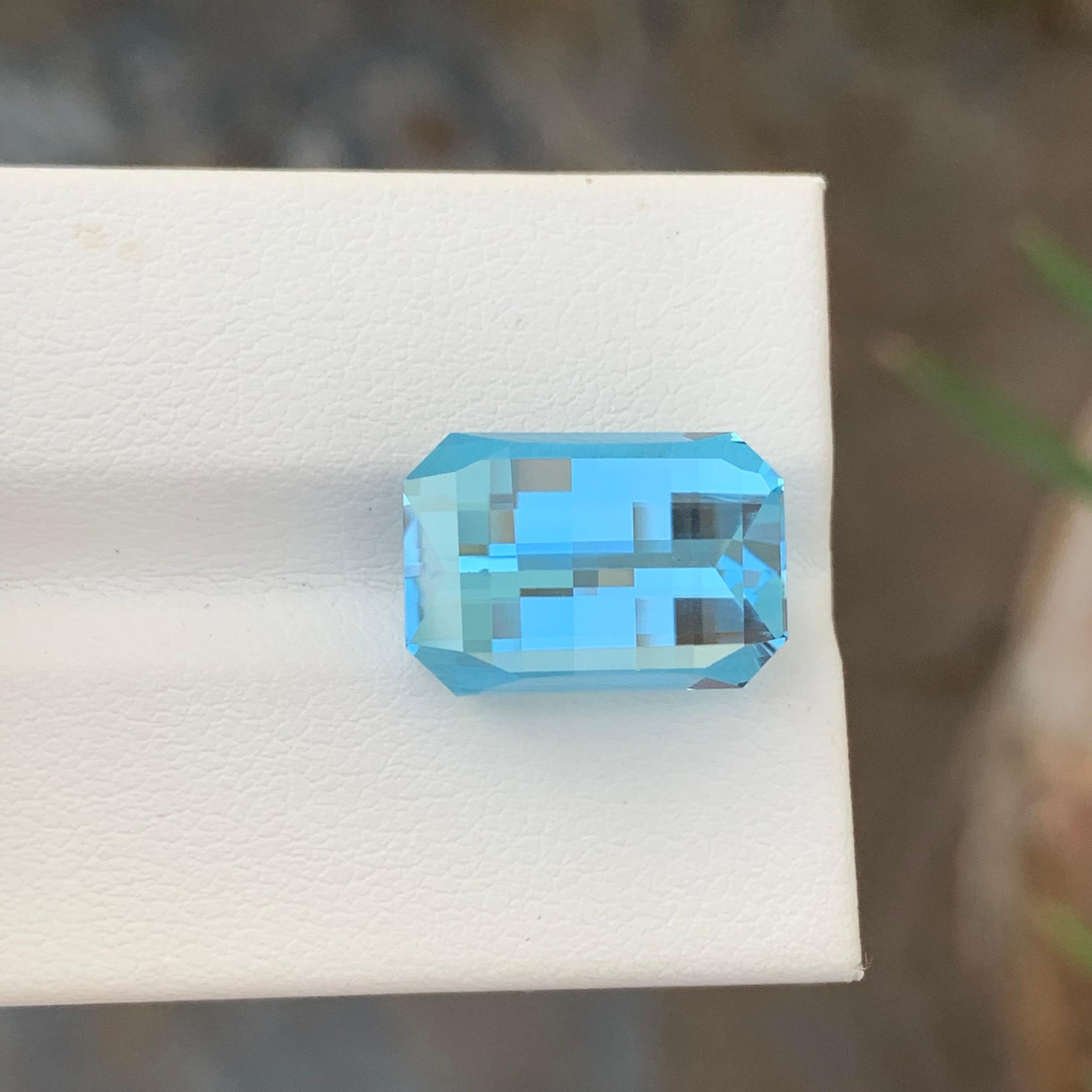 Loose Blue Topaz
Weight: 13.95 Carats
Dimensions: 15.3 x 10.4 x 8.8 Mm
Origin: Brazil
Shape: Emerald 
Color: Blue
Certificate: On Demand

Benefits Of Wearing Blue Topaz Stone:
It helps to improve communication and self-expression.
It provides inner