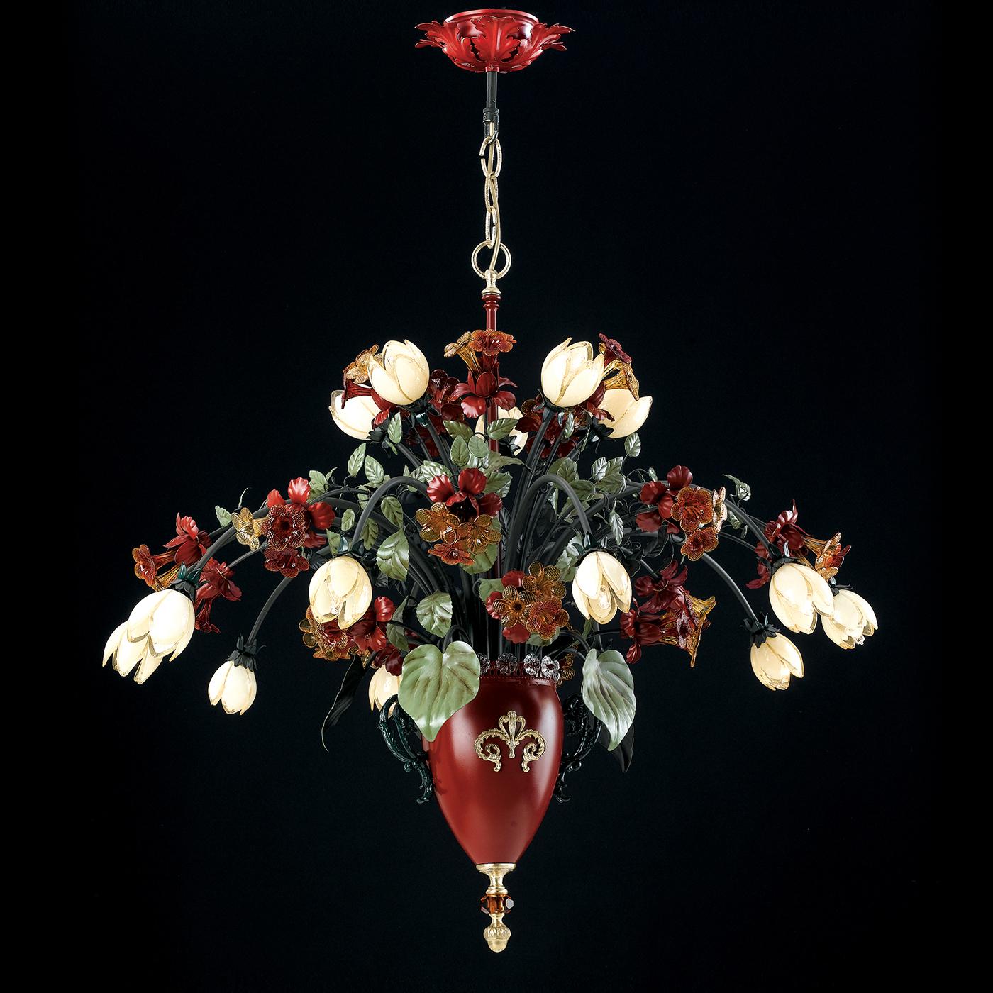 Designed to represent a spectacular hanging vase, this stunning 15 Lights Chandelier is crafted in hand-decorated metal and features amber colored murano glass. The striking Murano glass flowers in a two-tone amber and red coloring bring an element