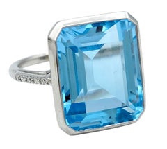 13.97 Carat Emerald Cut Blue Topaz Ring with Diamonds in 18 Karat White Gold