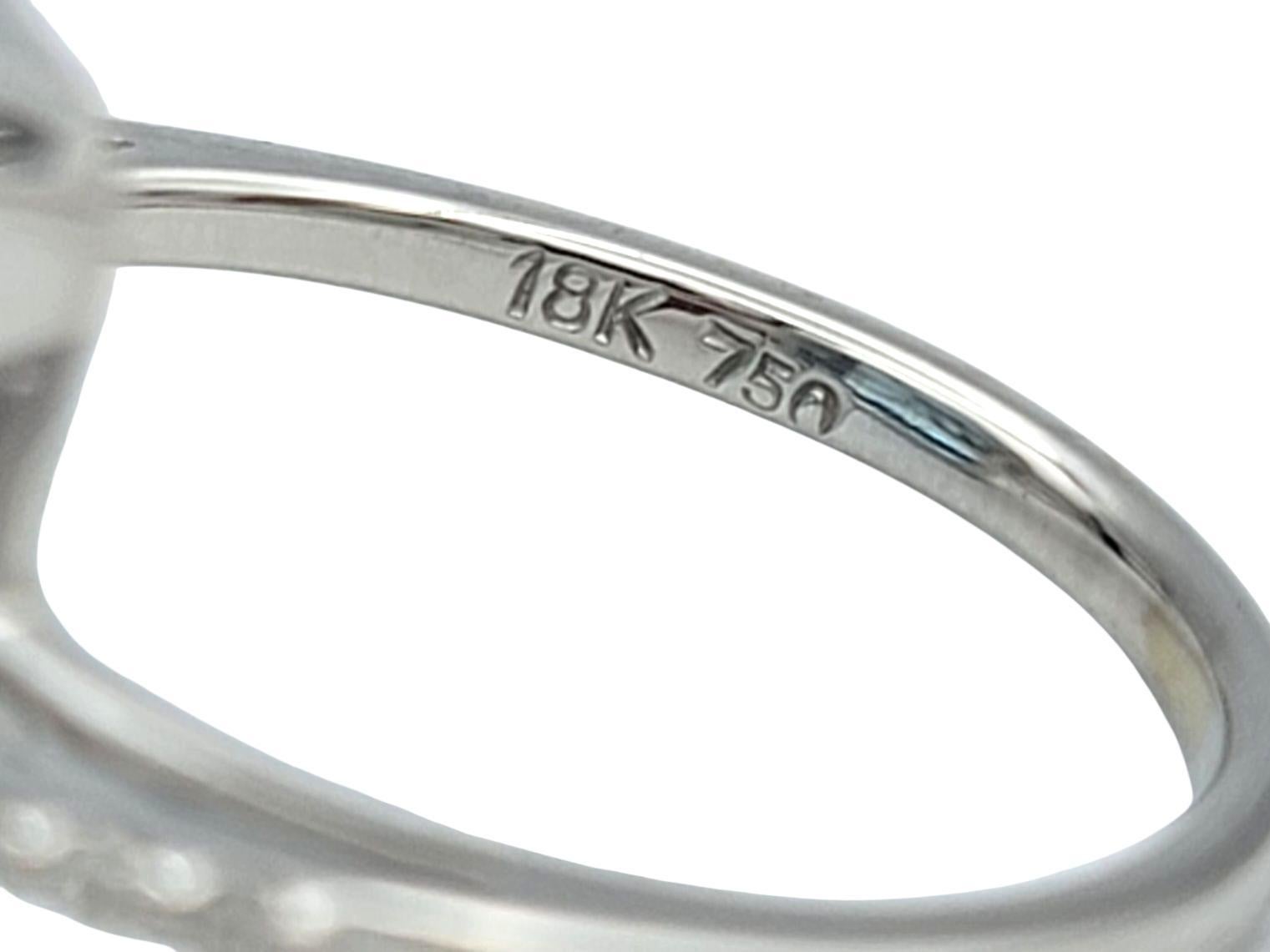 13,97 Karat Blauer Topas im Smaragdschliff mit Diamanten in 18 Karat Weißgold im Angebot 1