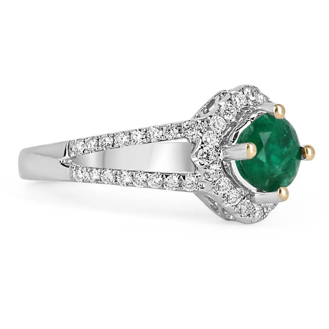 Seien Sie darauf vorbereitet, viele Komplimente für diese Schönheit zu bekommen! Dies ist ein prächtiger 1,34 tcw natürlicher kolumbianischer Smaragd und Diamant Split Shank Verlobungsring. Dies ist ein perfekter Statement-Ring mit einem prächtigen