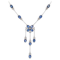 13k White Gold 8.04ctw Sapphire and 1.47ctw Diamond Trefoil Station Necklace