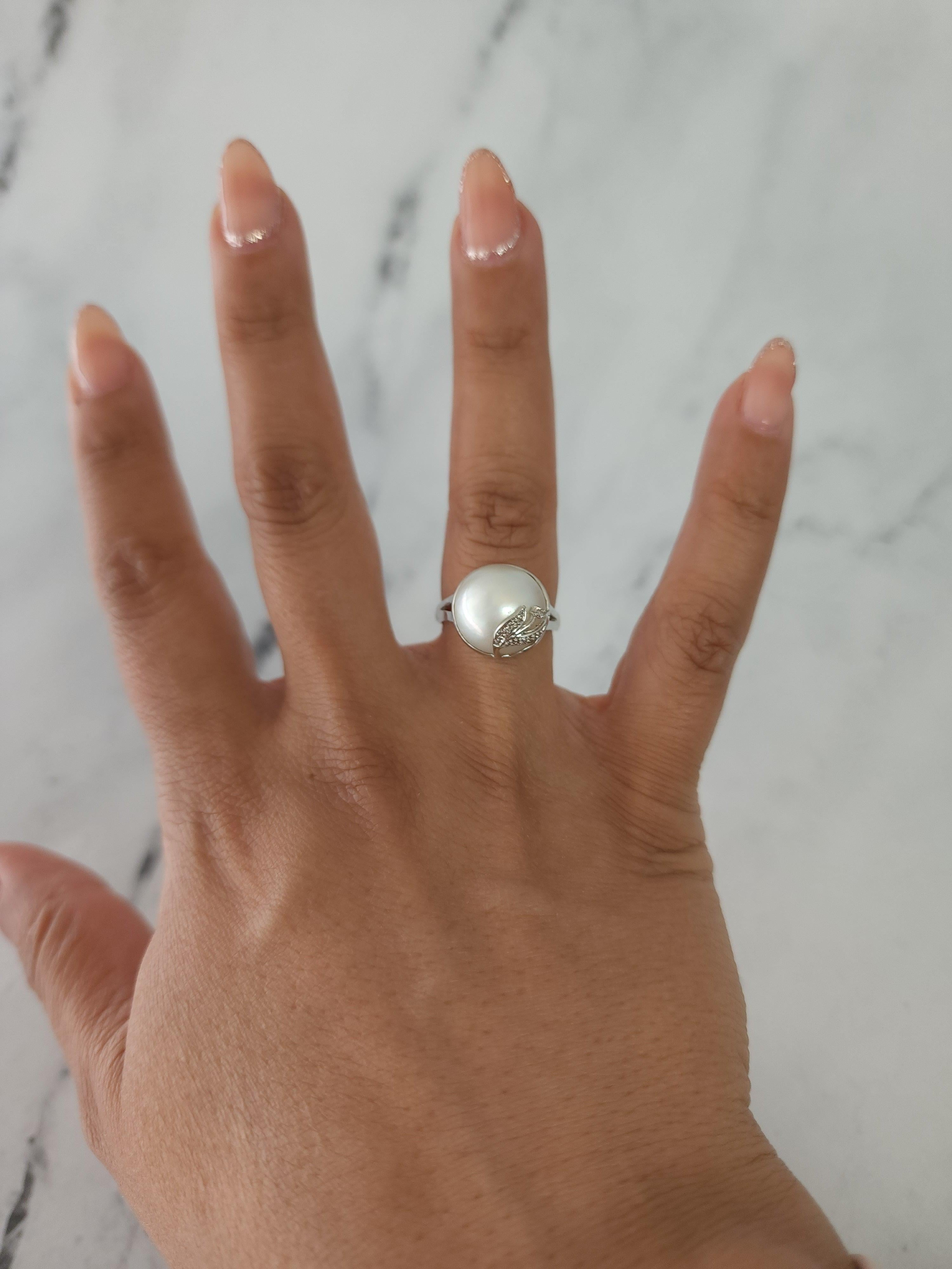 ♥ Product Summary ♥

Main Stone: Mabe Pearl & Diamonds
Pearl Size: 13-14MM
Band Material: 14k White Gold